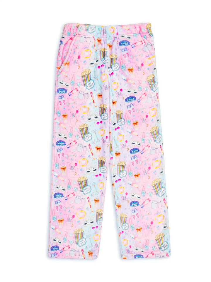 Pink pajama pants with colorful sleepover icon pattern on a white background