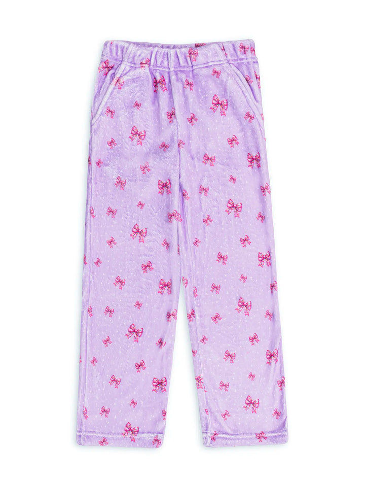 Purple pajama plush lounge pants with pink bow pattern on a white background