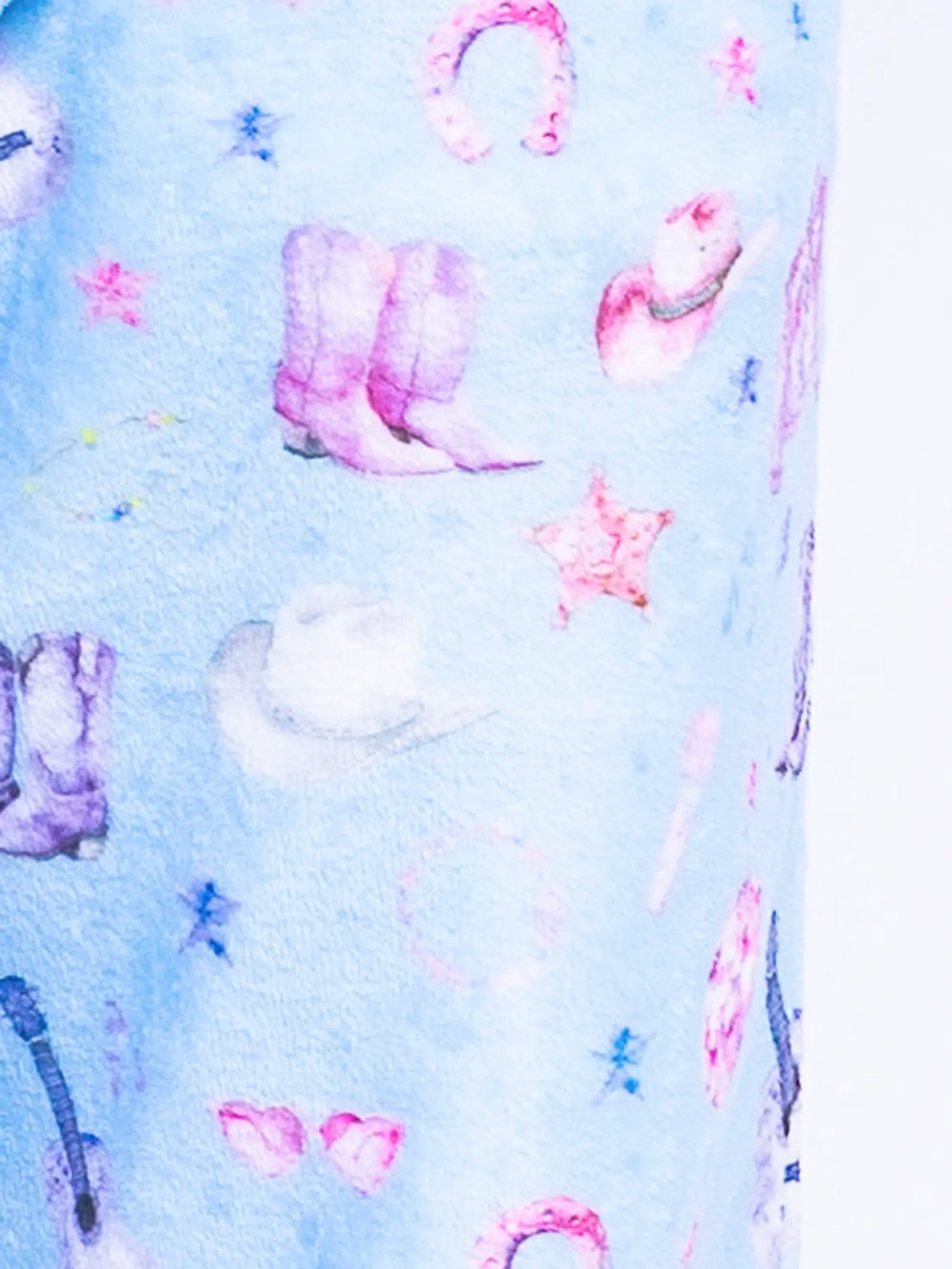 colorful western print on light blue plush bottoms