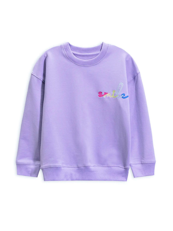 Purple sweatshirt with colorful smile embroidered on a white background