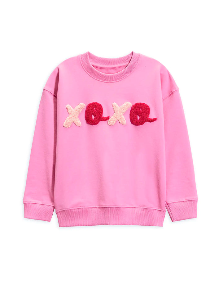 Pink sweatshirt with 'xoxo' detail on a white background
