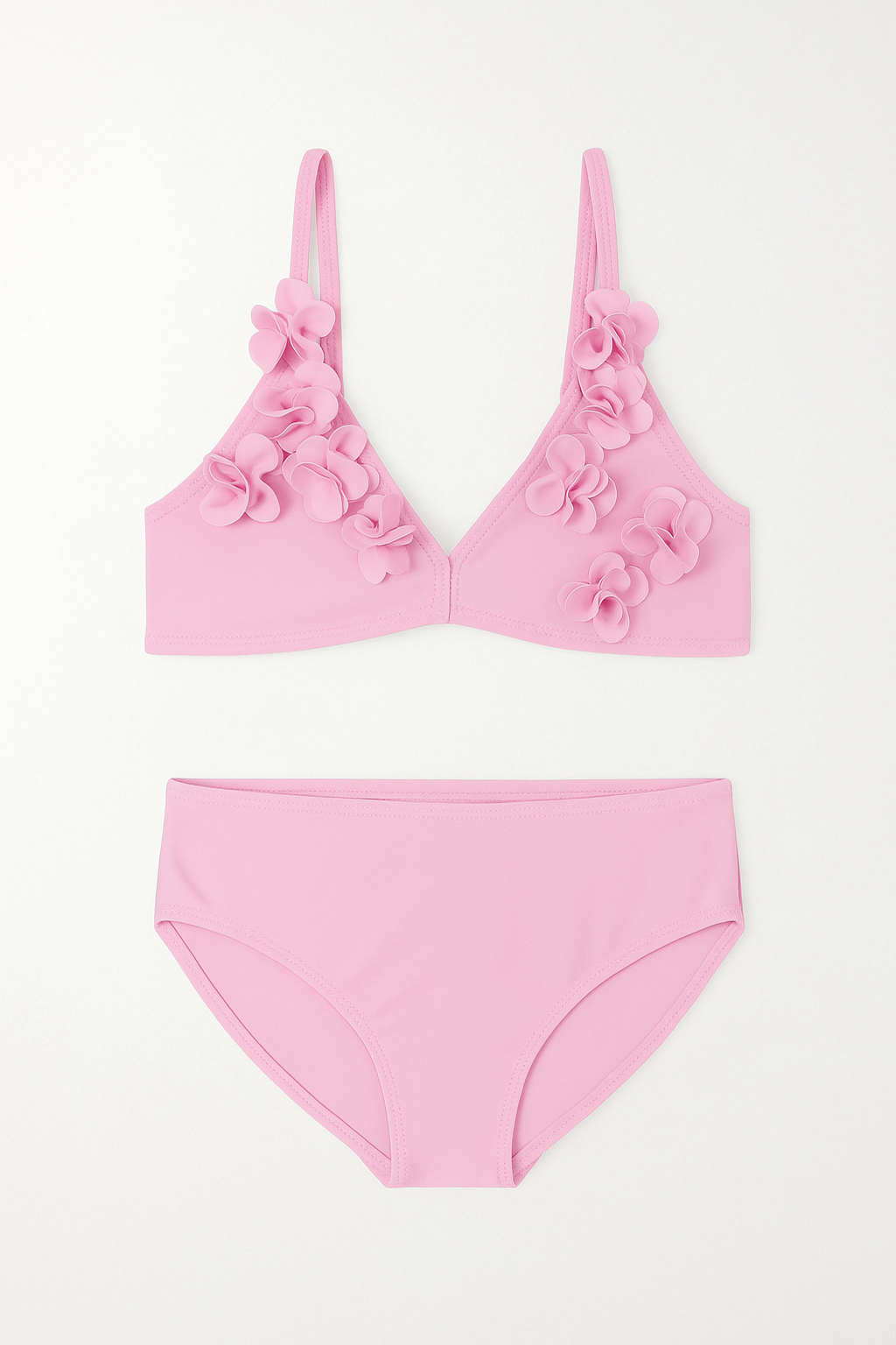 Pink bikini set with floral details on a white background