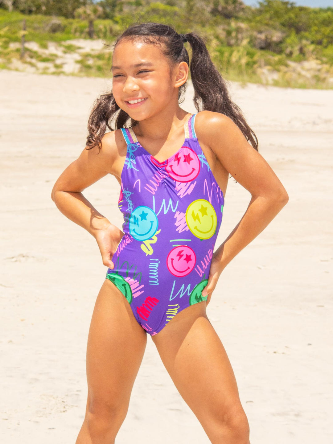 girls purple one piece swimsuit with smiley face print