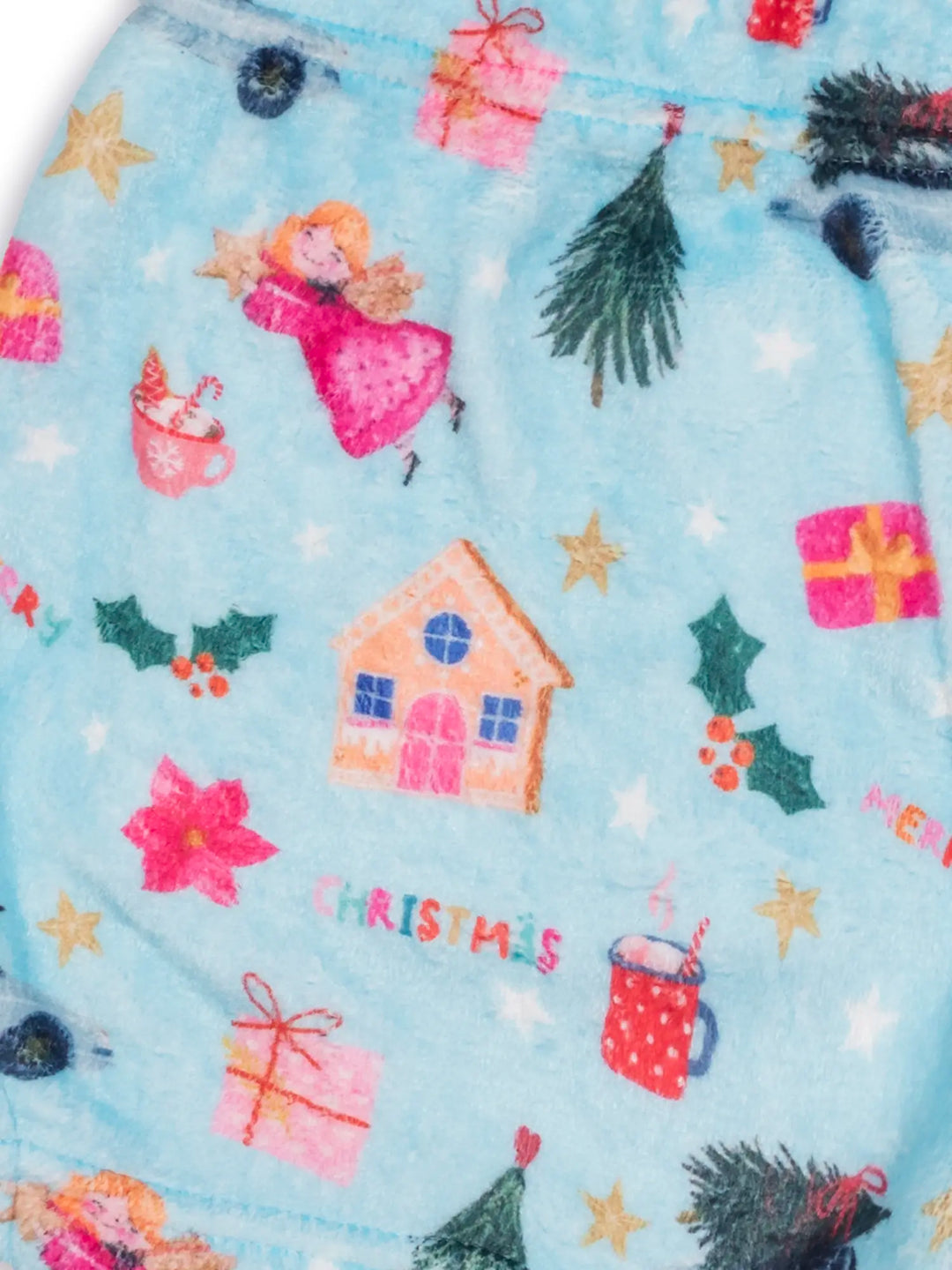 Christmas-themed fabric with gingerbread house, presents, and snowflakes on a blue background