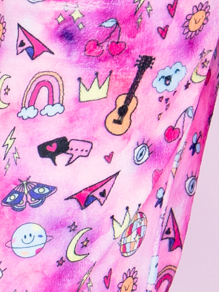 Colorful pattern of various doodles on a pink background of a plush pant