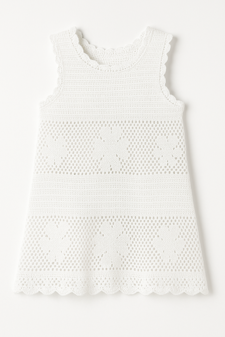 White knitted coverup dress on a white background