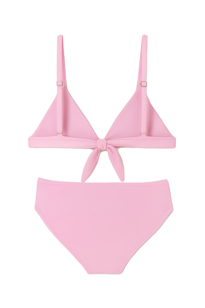 Pink bikini set on a white background