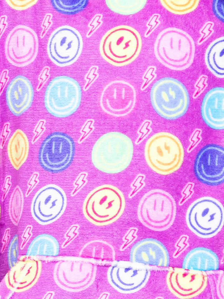 Pattern of smiley faces and lightning bolts on a purple background